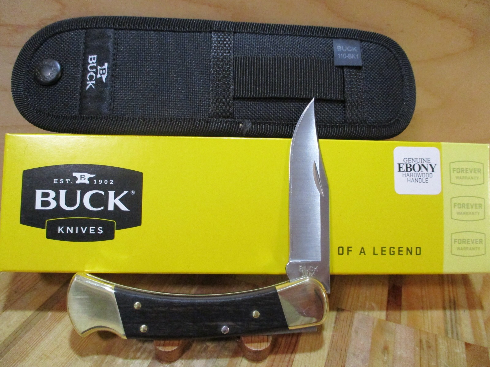 Buck 110 folding knife with sheath and box